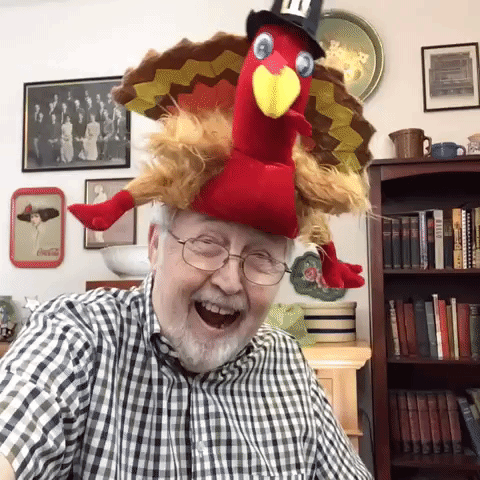 Older man with turkey hat gif