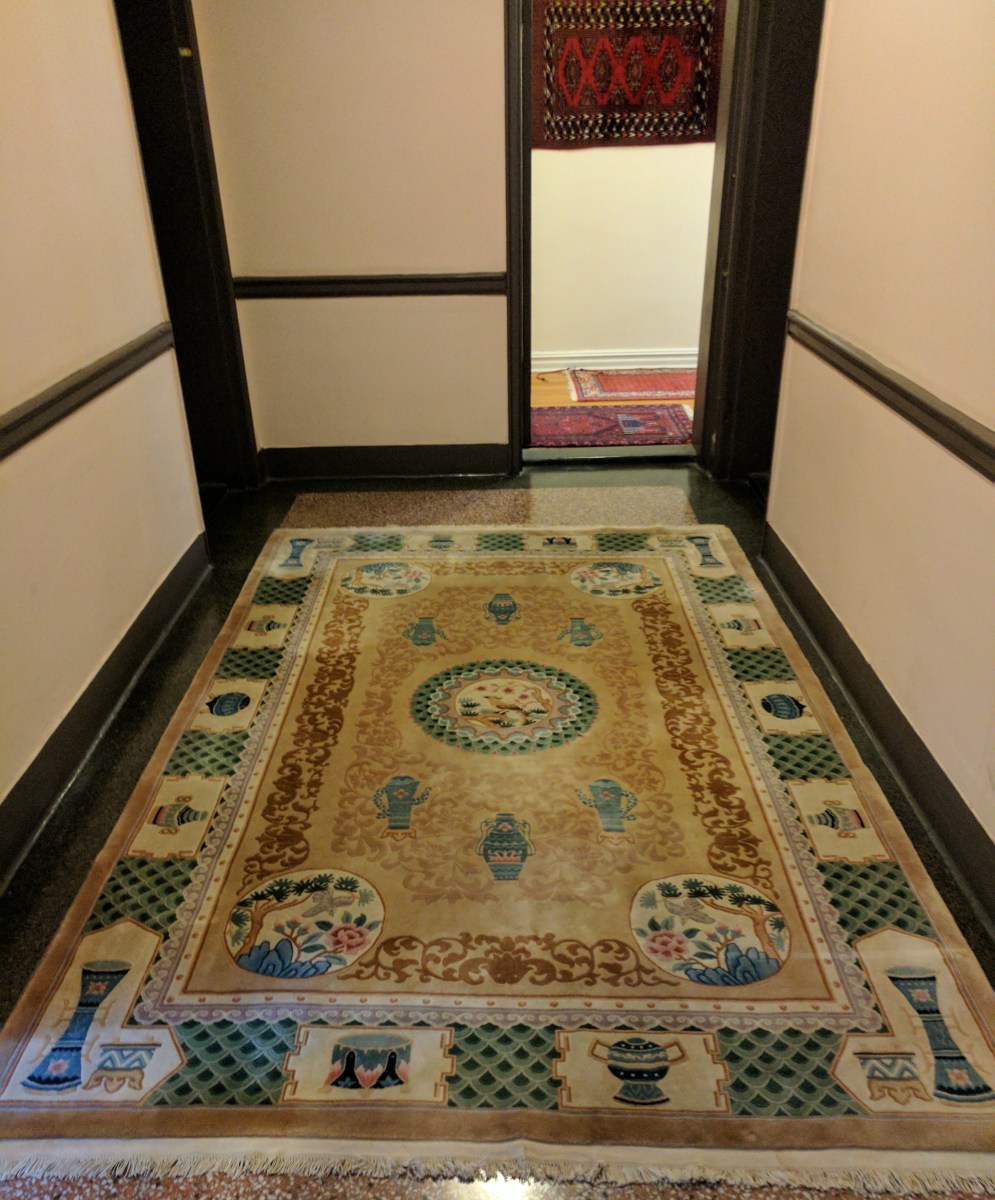 Chinese rug with vase motif