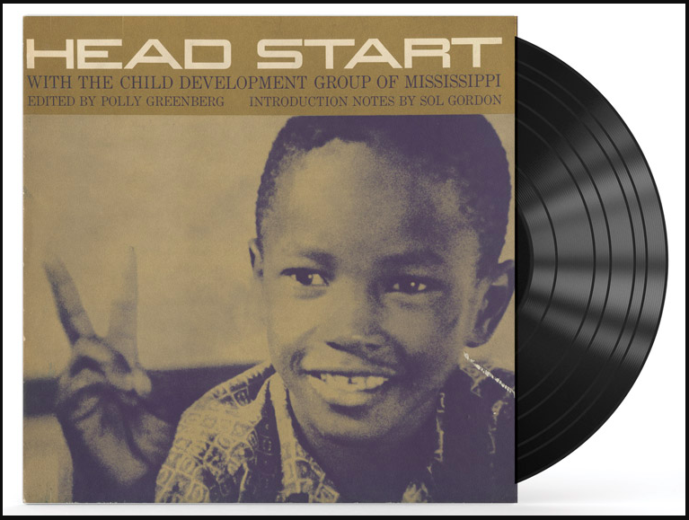 Vinyl LP with little boy making peace sign