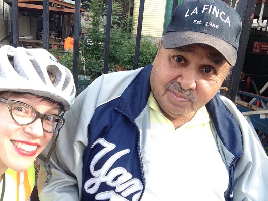 Woman in bike helmet next to man in baseball cap